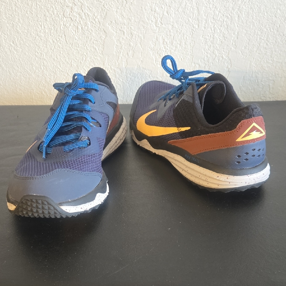Nike Men's Athletic Shoes in Blue and Cream with Reddish Brown.